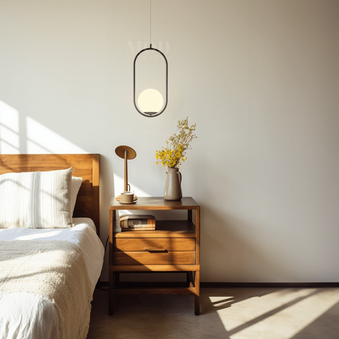 Minimal Black Metal Oval Cage Pendant Light | Adjustable Warm Light for Dining Room 4